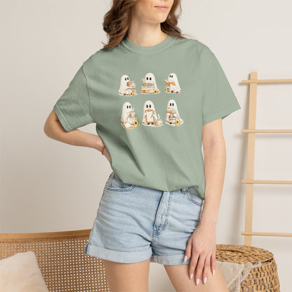 Woman wearing sage green Comfort Colors Ghost Teacher Shirt with hand-illustrated ghosts holding books design - The Teechers Thread