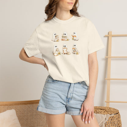 Woman wearing cream Comfort Colors Ghost Teacher Shirt with hand-illustrated ghosts holding books design - The Teechers Thread