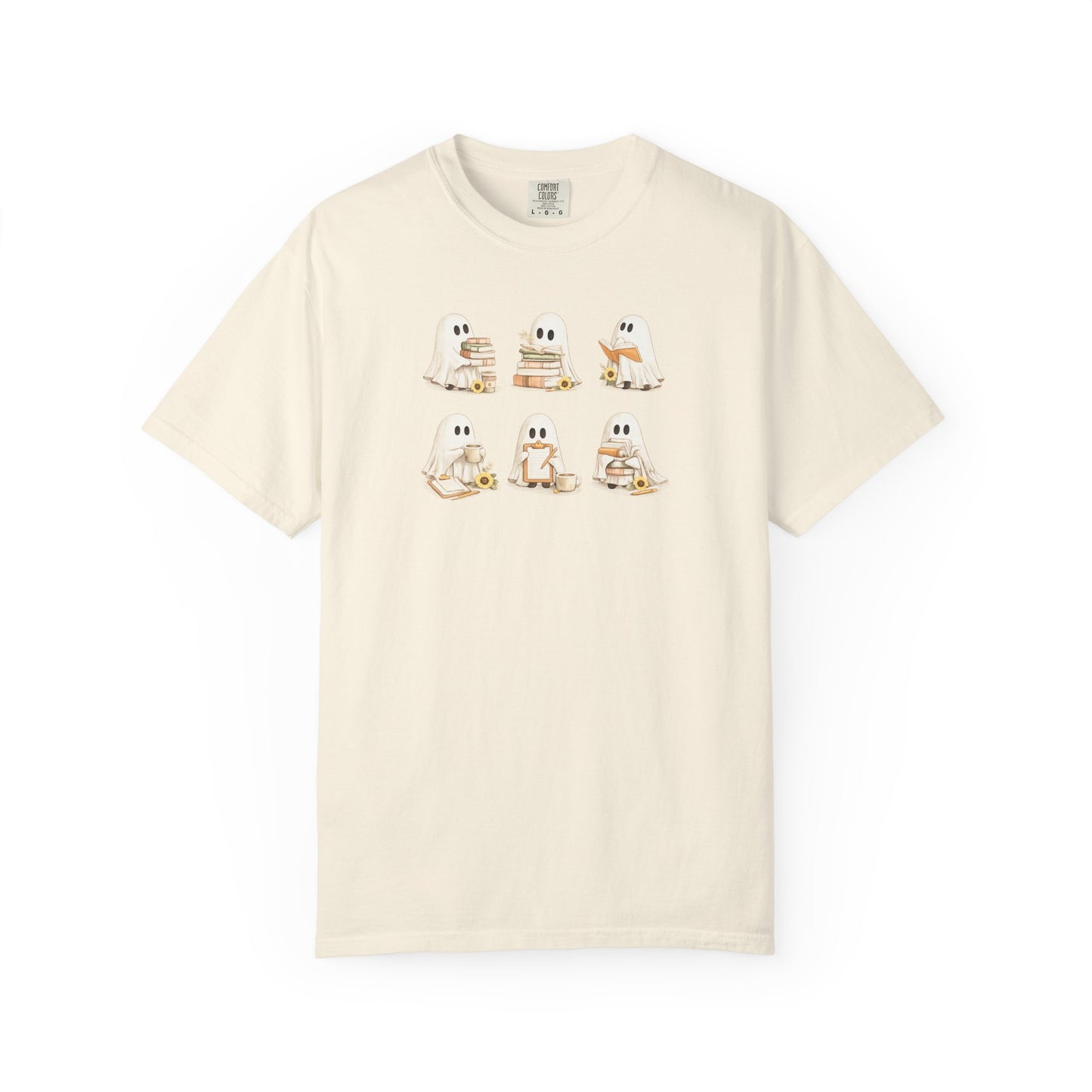 Cream Comfort Colors t-shirt with six hand-illustrated ghosts holding books, front view - Ghost Teacher Shirt by The Teechers Thread