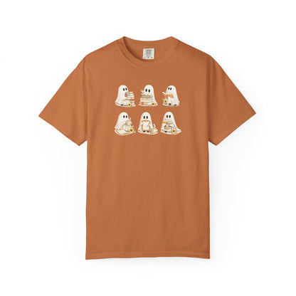 Rust orange Comfort Colors t-shirt with six hand-illustrated ghosts holding books, front view - Ghost Teacher Shirt by The Teechers Thread