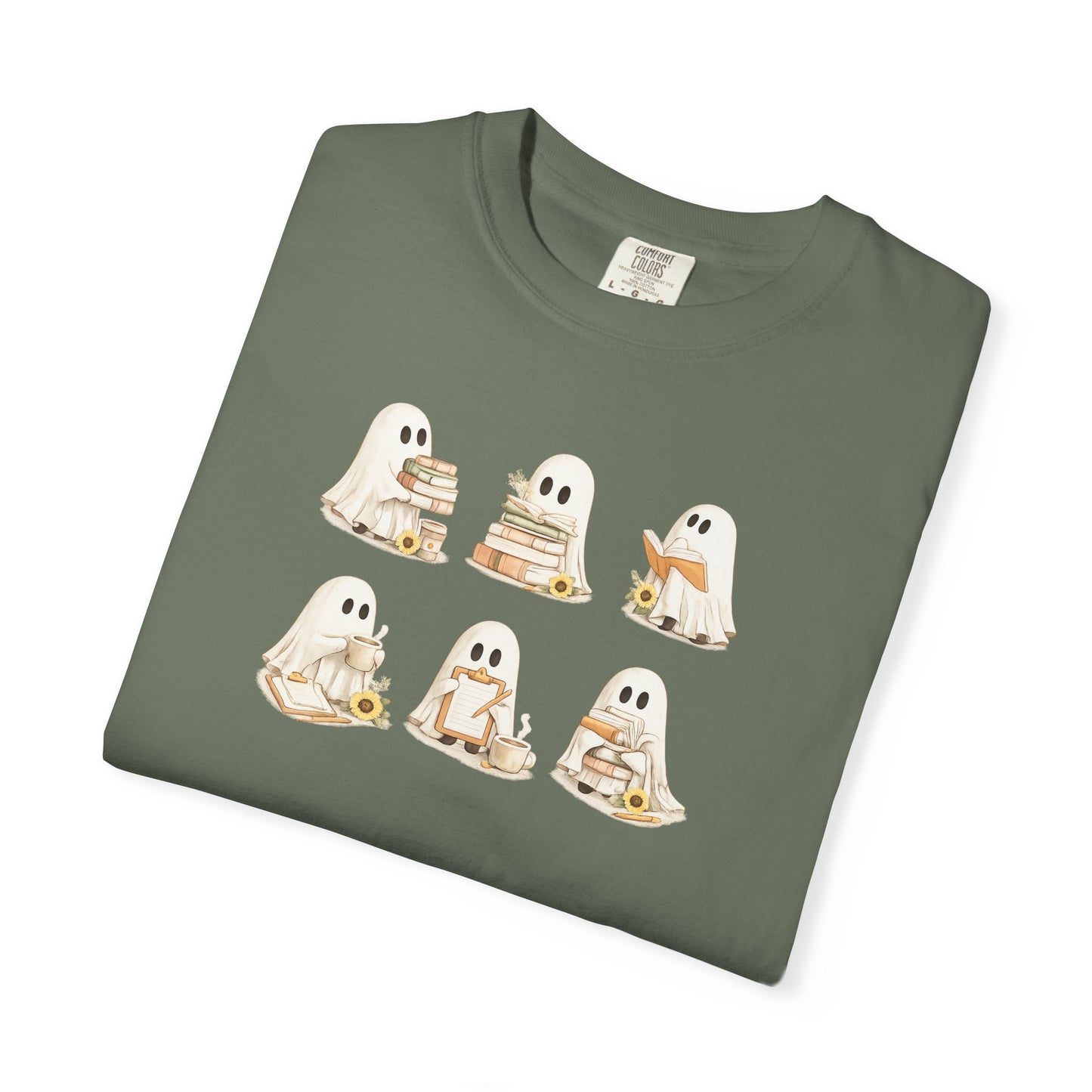 Forest green Comfort Colors t-shirt folded flat lay with six hand-illustrated ghosts holding books design - Ghost Teacher Shirt by The Teechers Thread